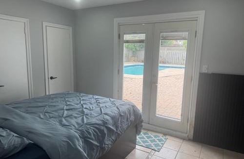 Brampton West Villa | Poolside Retreat with Private Patio