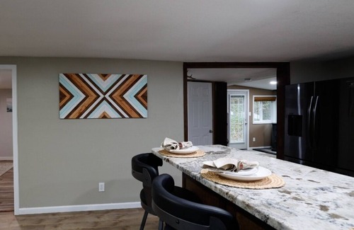 Ahsahka Cottage | Popular Clearwater river Idaho. Enjoy Outdoor kitchen, and spa shower.