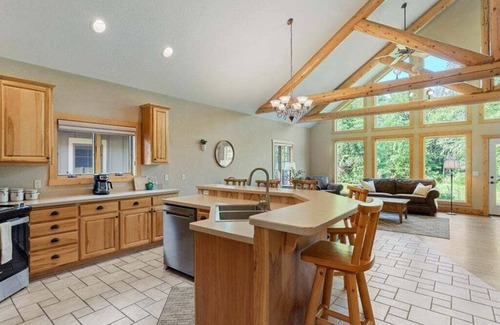 Nisswa House | Popular Interlachen Condo with Relaxing Creek Views & steps away from Gull Lake