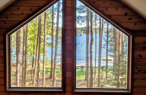 Eagle River House | Porch in the Pines | Lakefront home w/AC! Sandy Beach, Dock, Dogs OK
