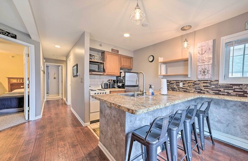 Onekama Condo | Portage Lake Condo w/Deck & Pool Access!