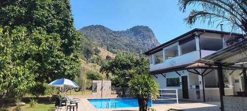 Sertao do Taquari Hotel | Pousada Cantinho do Sossego Paraty tem Piscina com Vista pra Montanha, Salão de Jogos, Café da Manhã, Estacionamento, Gerador de Energia, Próximo as principais Praias, Ilhas e Cachoeiras