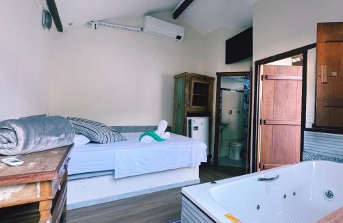 Itaunas Other | Pousada Dunas - Suítes com HIDROMASSAGEM no coração da Vila