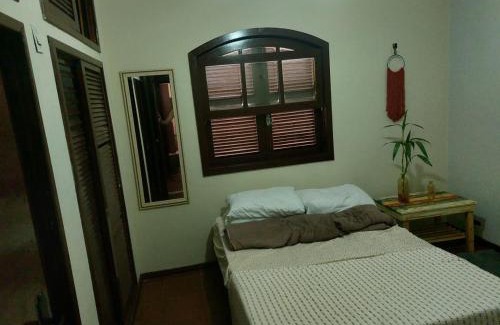 Itauna House | pousada sol das amendoeiras