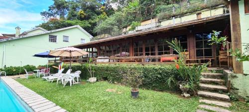 Quitandinha House | Pousadinha Lá em Casa