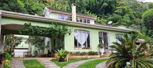 Quitandinha House | Pousadinha Lá em Casa