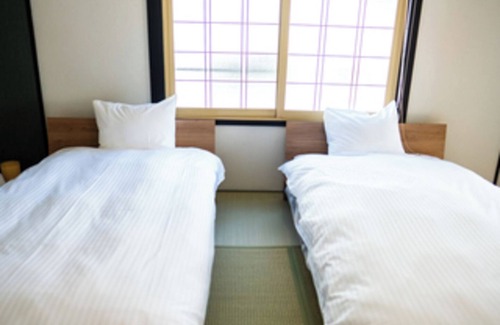 Kutchan House | Powder Chalet Niseko 1F-T Tokapchup, "the Sun"