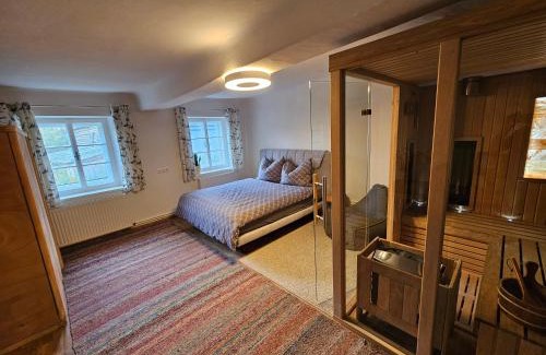 Sankt Martin am Grimming Apartment | Premium Apartment mit privatem Whirlpool, Sauna, Garten