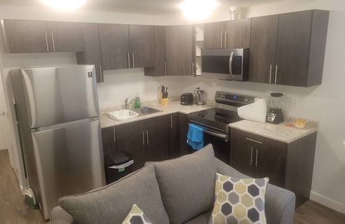 Saskatoon House | Prestige Suite-beautifully finished 2 bedroom home