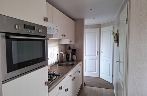 Serooskerke Ski Chalet | Pretty chalet with free WiFi on a friendly camping site
