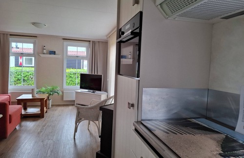 Serooskerke Ski Chalet | Pretty chalet with free WiFi on a friendly camping site