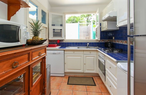 Sainte-Anne Villa | Pretty, old Creole villa with veranda, gazebo and floral garden.