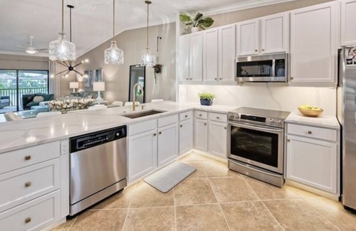 Naples Condo | PRICE DROP! Treviso Bay - Beautiful waterfront condo with social club membership