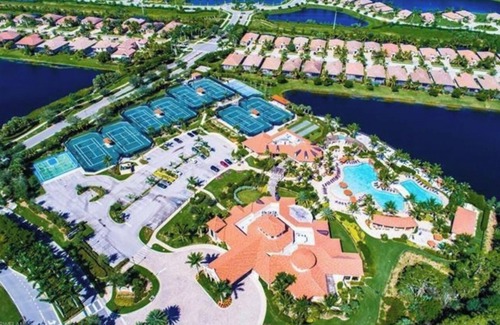 Naples Condo | PRICE DROP! Treviso Bay - Beautiful waterfront condo with social club membership
