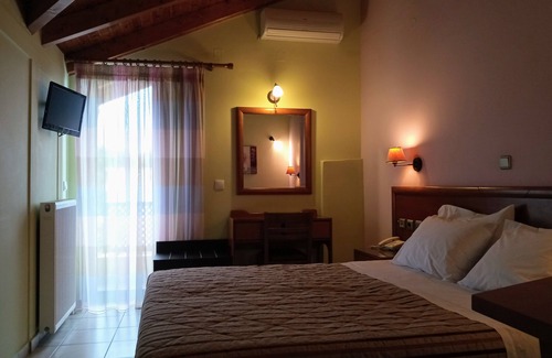 Loutra Ypatis Hotel | Prigipikon Suites & Lofts
