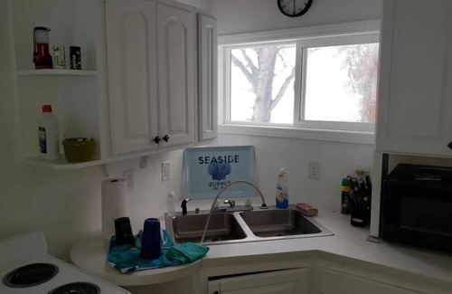Okoboji Cabin | Prime East Lake beachfront cabin with boat hoist in Okoboji