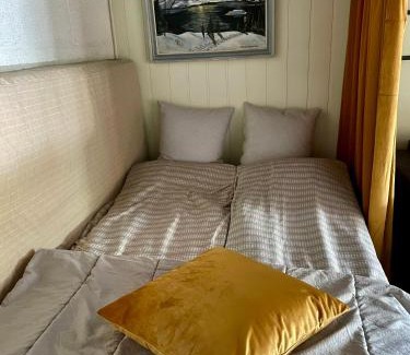 Eidsvoll House | Primitive basement room with shared toilet, without shower