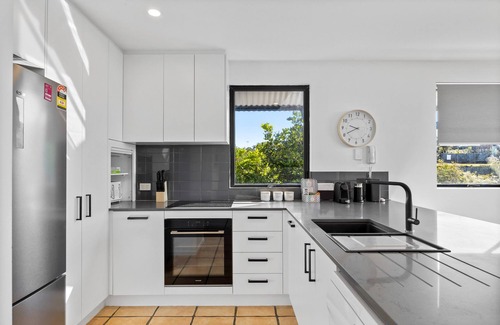 Sunrise Beach Apartment | Pristine 2-Bed Apartment with Pool and Balcony