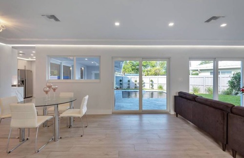 Coral Ridge House | Pristine and Modern Bayview Bungalow With Heated Pool!