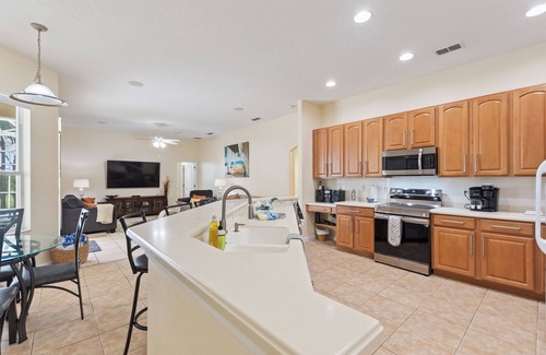 Highlands Reserve Villa | Pristine sunset villa with golf course views. and 15 minutes from Disney.