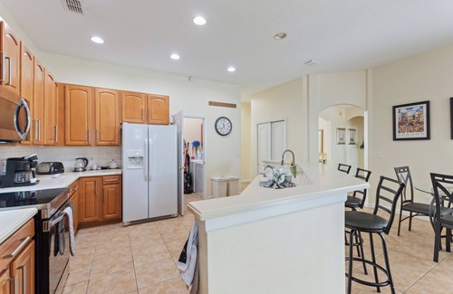 Highlands Reserve Villa | Pristine sunset villa with golf course views. and 15 minutes from Disney.