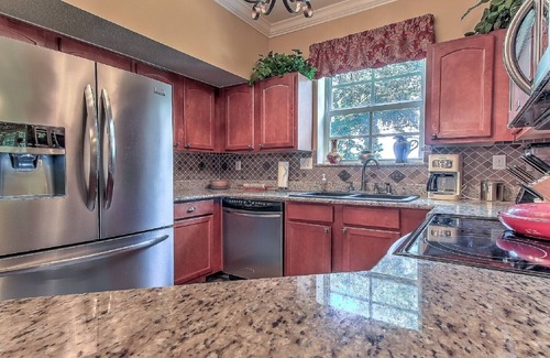 Stuart Condo | Pristine two bedroom garden apartment, gourmet kitchen and wireless internet.