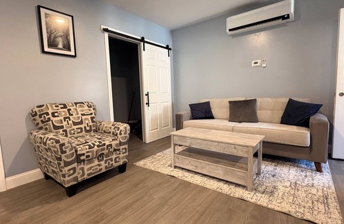 Palmyra Apartment | Pristine upscale 2 bedroom duplex unit surrounded by forest.