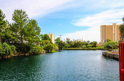 Gulf Lagoon Beach Apartment | Pristine water front condo with sauna, pool, tennis court & WiFi