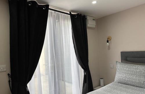 Cavan Apartment | Private Detached Small Bedroom and Bathroom Only- This is not an apartment- No clothes storage- no cooking facilities
