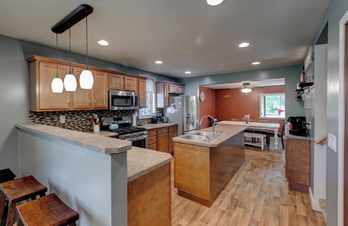 Croswell House | Private access Riverbend Retreat, fishing, canoes, wildlife, & swinging bridge