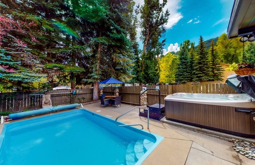 West End Apartment | Private balcony room on Main St - pool & hot tub - walk to lifts, dog-friendly