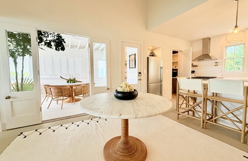 Dunmore Town House | Private Beach And Dock. Coconut Shy Cottage - A Waterfront Private Residence