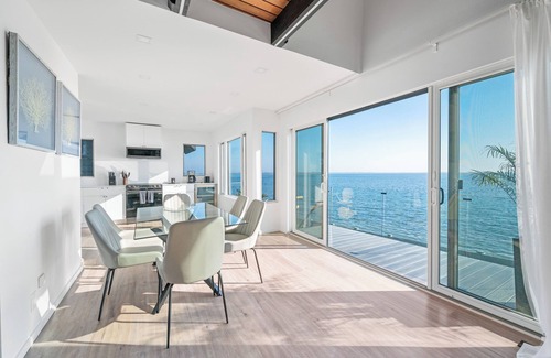 Hampton Bays House | Private beach on a fenced in property sunset views