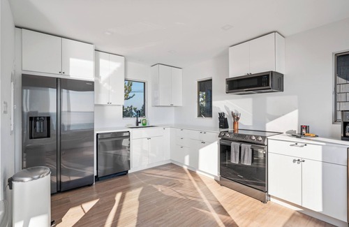 Hampton Bays House | Private beach on a fenced in property sunset views