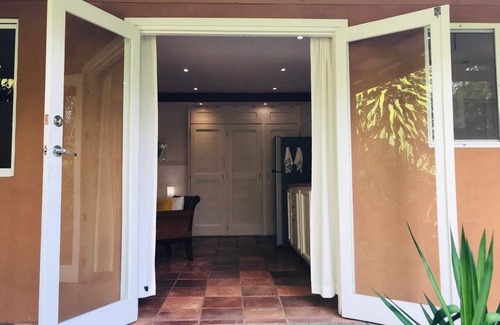 Palm Beach Estates Cottage | Private Beach studio private garden steps from the beach. Bike + Boogie bd incl