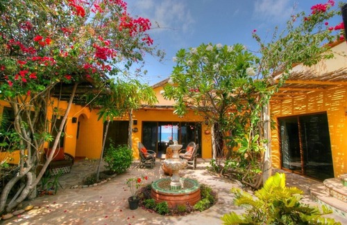 El Cardonal House | Private Beachfront House with Heated Pool in Quaint Coastal Town