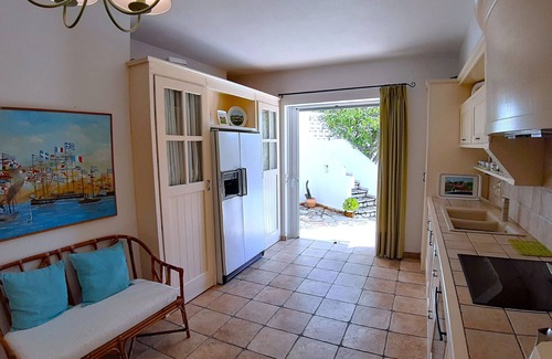 Skaloma Villa | Private beachfront villa in traditional village setting