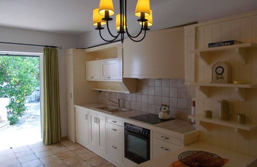 Skaloma Villa | Private beachfront villa in traditional village setting