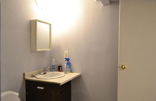 Southeast Calgary House | Private Bedroom in Basement - Erin Woods