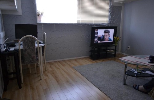 Calgary House | Private bedroom in basement suite - Pineland