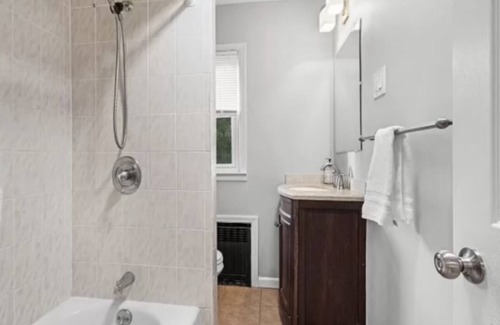 Summit House | Private bedroom in second floor with a share bathroom in a family home.