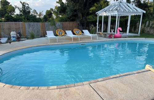 Pretty Bayou House | Private Bungalow with pool across the street from bay! 5 min drive to the beach.
