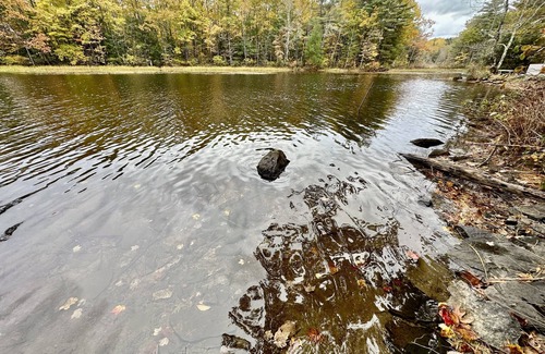 Litchfield House | Private camp site on Sand Pond, nicely furnished RV & your own private dock!
