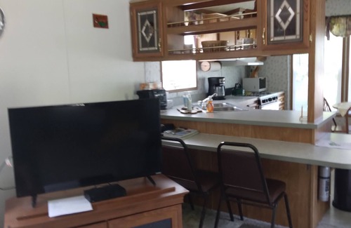 Pulaski House | Private, clean, and cozy North Sandy Pond retreat! Close to beach and marina.