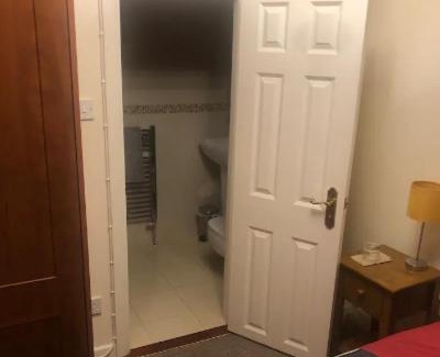 Clontarf House | Private comfortable bedroom with ensuite