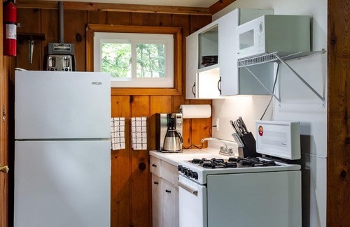 Gwinn Cottage | Private Deluxe Lakeside Cottage, Fishing, Snowmobiling, Hunting, Boats, Hot Tub
