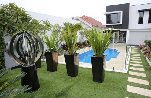 Tighes Hill House | Private Designer Oasis - City Views - Pool
