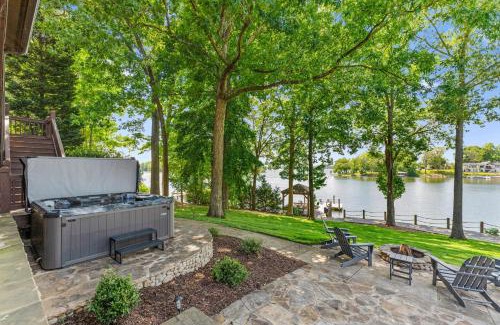 Mayhew House | Private Dock Hot Tub Game Room Firepit Sunset Shores Resort The Homestead