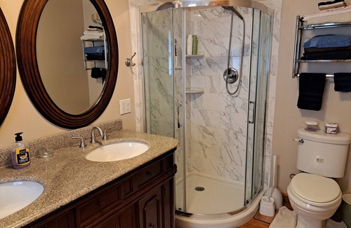New North End House | Private entrance master bedroom with private bathroom in the house.