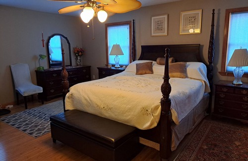 New North End House | Private entrance master bedroom with private bathroom in the house.